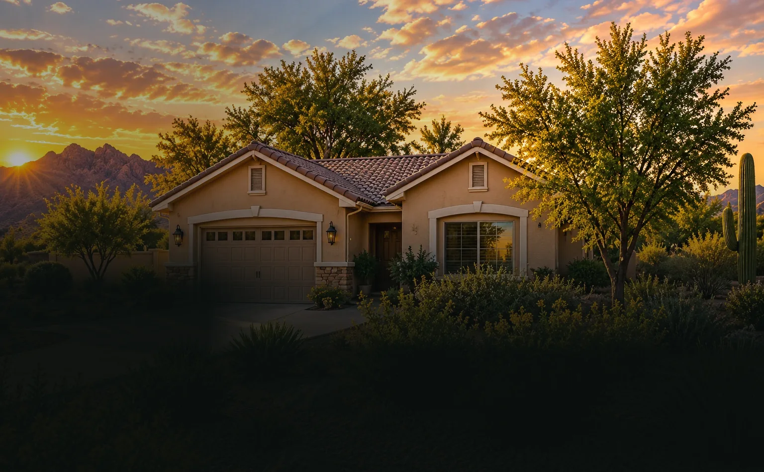 Arizona home with palms and desert landscaping