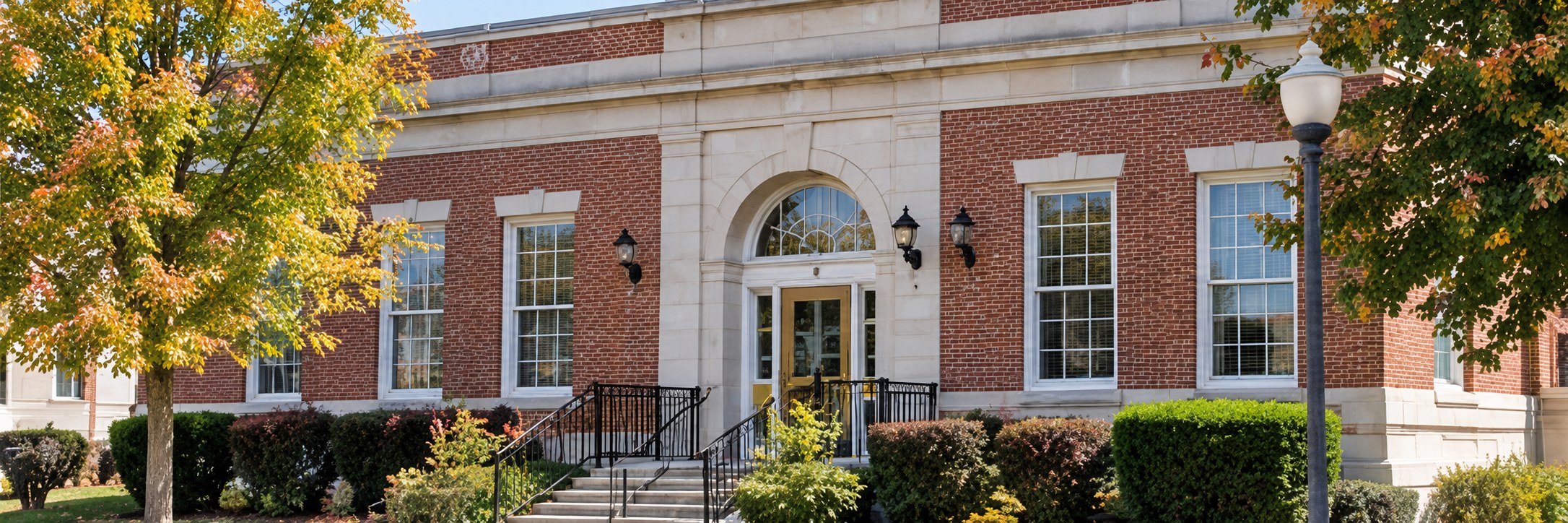 A brick office building on a small-town street in Trenton, Missouri