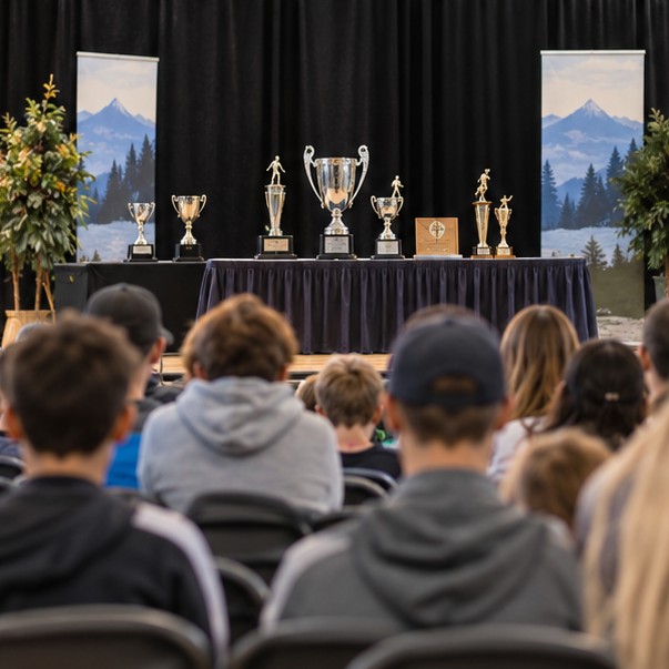Trophies on stage at an amateur sport awards ceremony