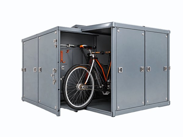 A bank of secure bike lockers with one door open and a bicycle inside