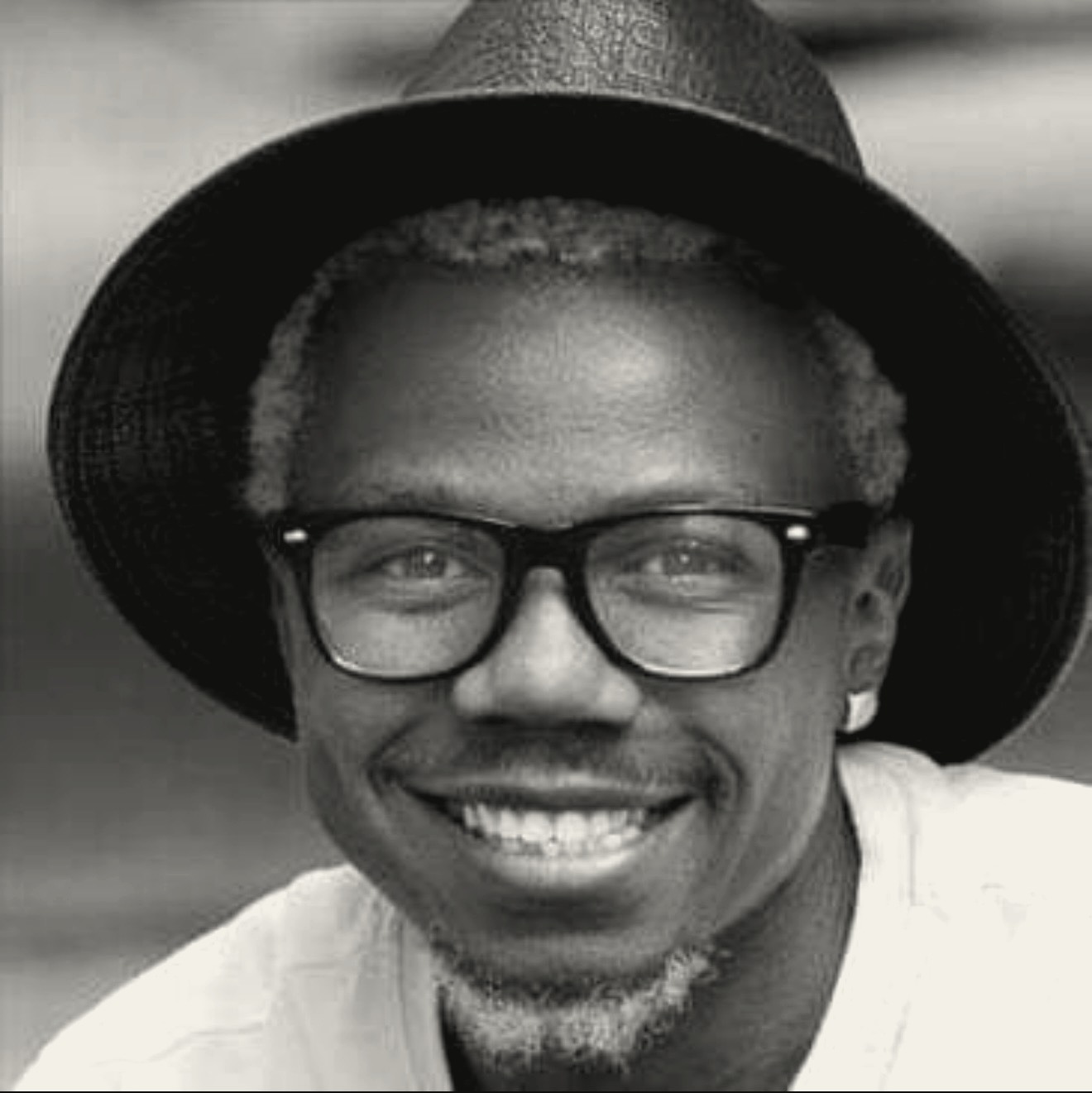 Prince Desire smiling welcome portrait
